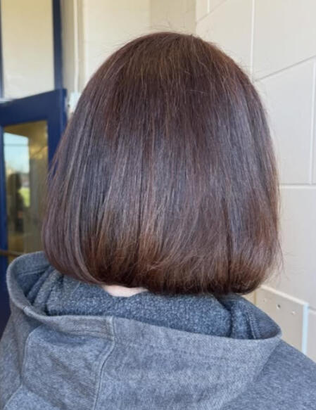 Grey coverage colour, and a one-length bob with texturizing on the ends for a soft look. Round-brushed to smooth natural curl pattern. Grey coverage colour, and a one-length bob with texturizing on the ends for a soft look. Round-brushed to smooth natural curl pattern.